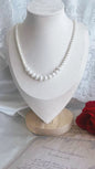 Fresh Water Pearl Smiley necklace 4-5mm, 7-8mm white pearls