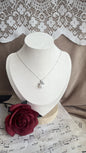 Silver 925 pendant with white fresh water pearl and zirconia (bow)