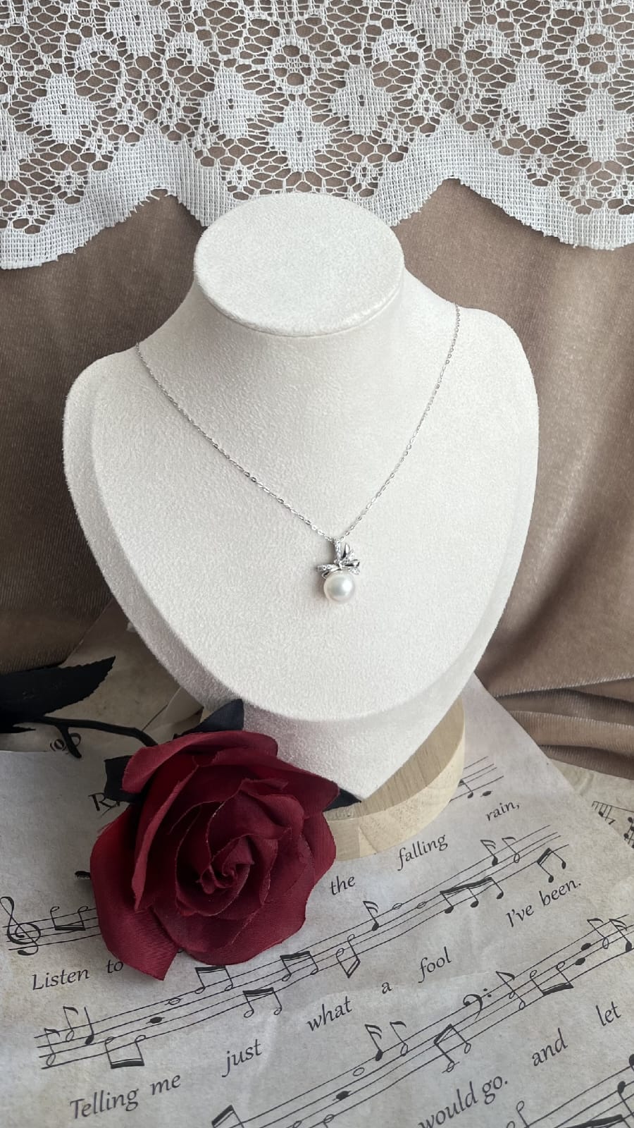 Silver 925 pendant with white fresh water pearl and zirconia (bow)