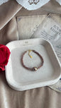 Purple Fresh water 2-2.5mm pearl bracelet with 9-10mm centre pearl, silver 925 golden plated parts