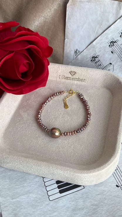 Purple Fresh water 2-2.5mm pearl bracelet with 9-10mm centre pearl, silver 925 golden plated parts